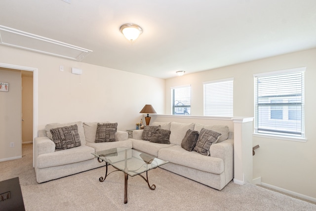 5529 Evanston Ln, Pasadena, TX 77505 - carpeted living area featuring attic access and baseboards