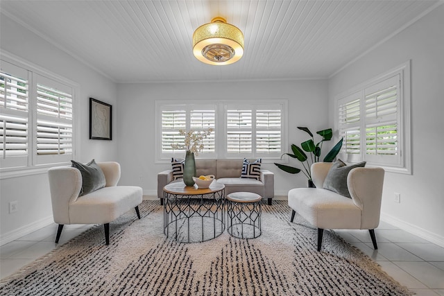2539 Addison Rd, Houston, TX 77030 - sitting room featuring tile patterned floors, plenty of natural light, and ornamental molding