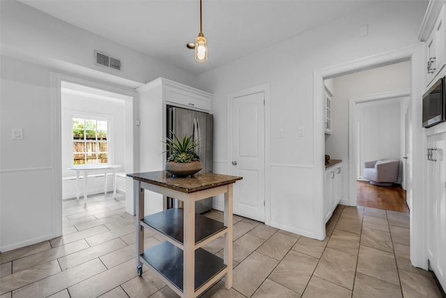 2539 Addison Rd, Houston, TX 77030 - hall with light tile patterned floors and baseboards