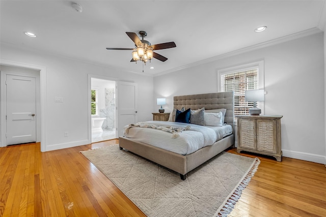 2539 Addison Rd, Houston, TX 77030 - bedroom with multiple windows, crown molding, light wood finished floors, recessed lighting, and ensuite bathroom