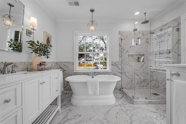 2539 Addison Rd, Houston, TX 77030 - full bath with a marble finish shower, vanity, crown molding, a chandelier, and a freestanding bath