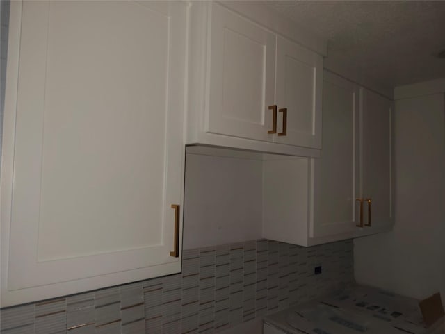 4104 Idaho St, Houston, TX 77021 - detailed view of white cabinetry and decorative backsplash