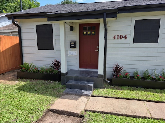 4104 Idaho St, Houston, TX 77021 - view of exterior entry with roof with shingles