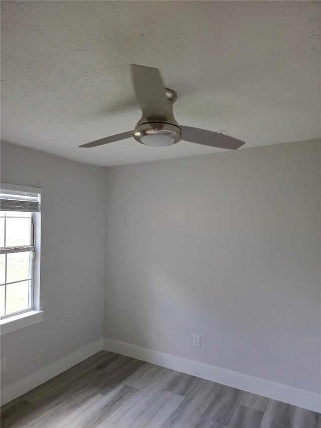 4104 Idaho St, Houston, TX 77021 - spare room with ceiling fan and wood finished floors