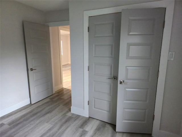 4104 Idaho St, Houston, TX 77021 - unfurnished bedroom featuring light wood finished floors and baseboards