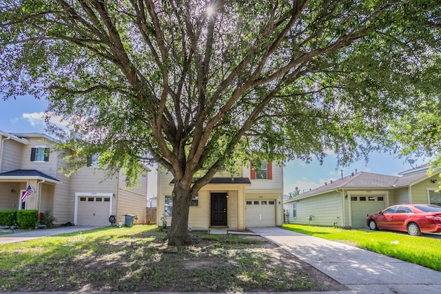 12026 Madison Oak St, Houston, TX 77038 - view of front facade with a garage