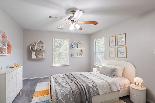 12026 Madison Oak St, Houston, TX 77038 - carpeted bedroom with a ceiling fan and baseboards