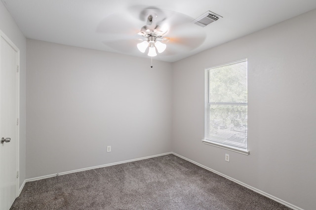 12026 Madison Oak St, Houston, TX 77038 - carpeted spare room with ceiling fan and baseboards
