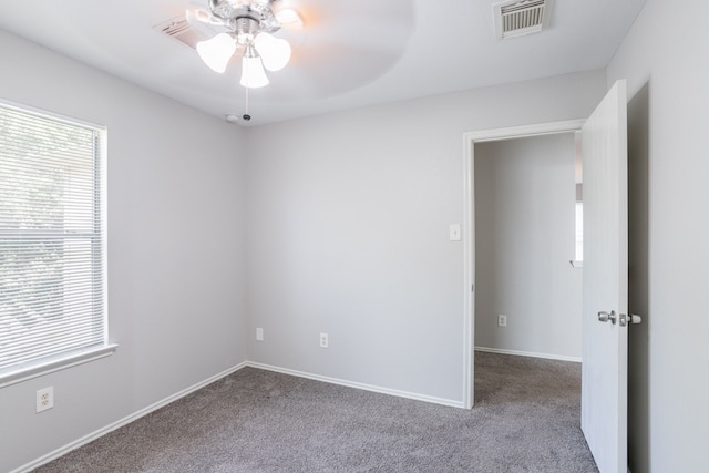 12026 Madison Oak St, Houston, TX 77038 - empty room featuring carpet floors and ceiling fan