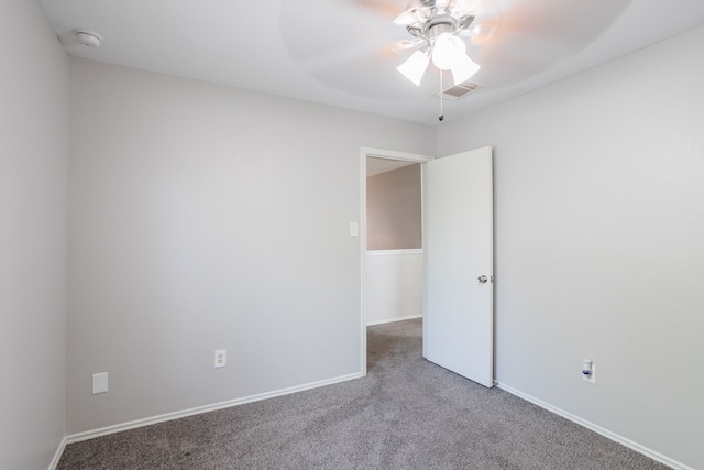 12026 Madison Oak St, Houston, TX 77038 - spare room with ceiling fan, carpet, and a smoke detector