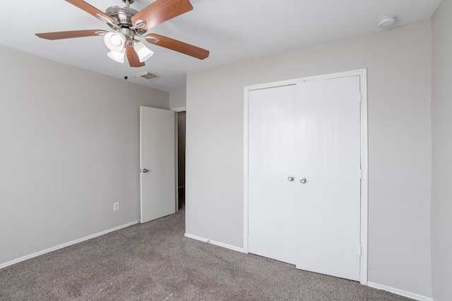 12026 Madison Oak St, Houston, TX 77038 - unfurnished bedroom featuring carpet and ceiling fan