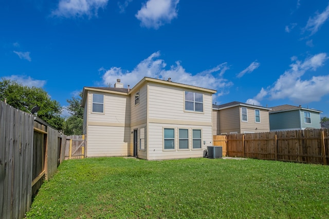 12026 Madison Oak St, Houston, TX 77038 - back of property featuring a fenced backyard and a chimney