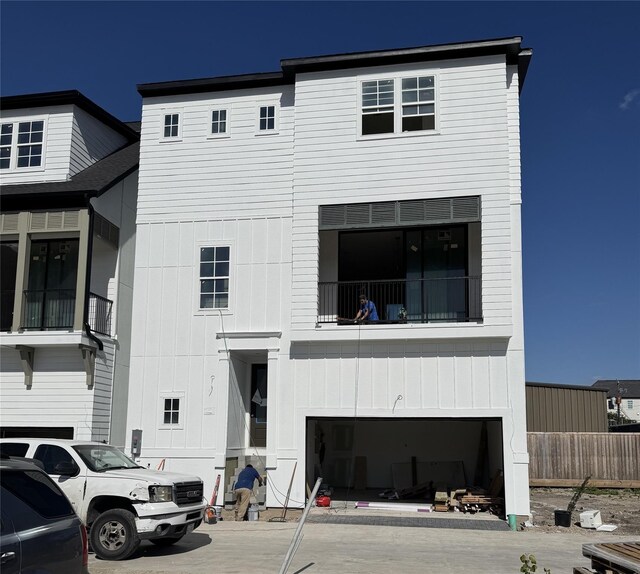 11057 Chatterton Dr, Houston, TX 77043 - view of front facade featuring a garage