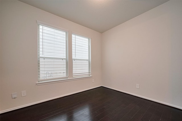 3414 Signor Dr, Houston, TX 77025 - unfurnished room with dark wood-style flooring
