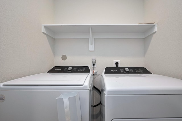 3414 Signor Dr, Houston, TX 77025 - laundry room featuring washer and dryer