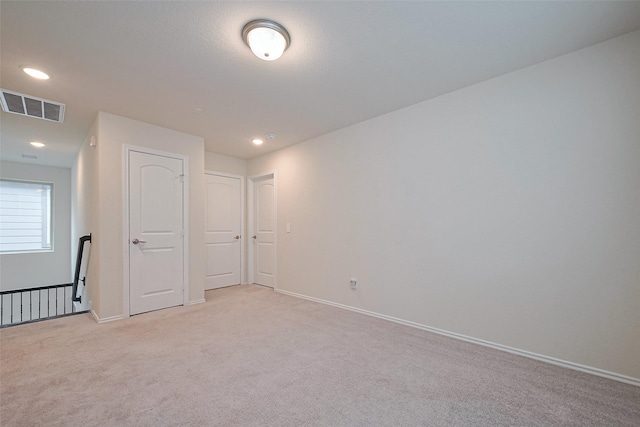 3414 Signor Dr, Houston, TX 77025 - spare room featuring light carpet and recessed lighting