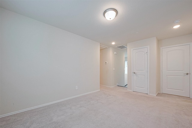 3414 Signor Dr, Houston, TX 77025 - empty room with light colored carpet, a smoke detector, and recessed lighting
