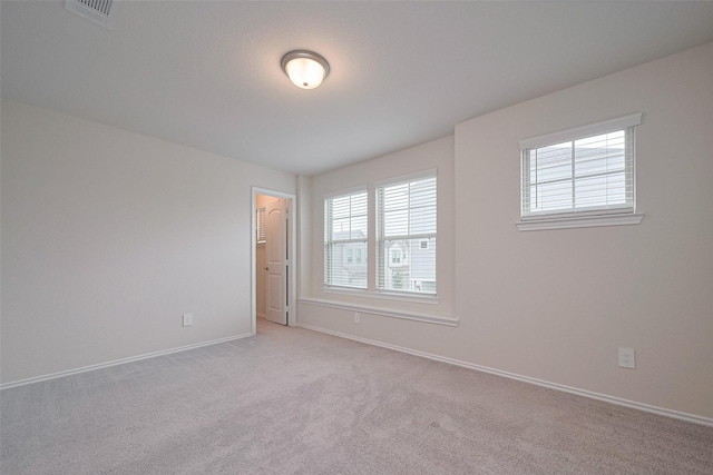 3414 Signor Dr, Houston, TX 77025 - spare room with healthy amount of natural light and light colored carpet