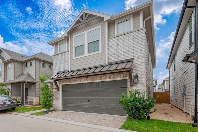 3414 Signor Dr, Houston, TX 77025 - multi unit property with a standing seam roof, a garage, brick siding, and decorative driveway