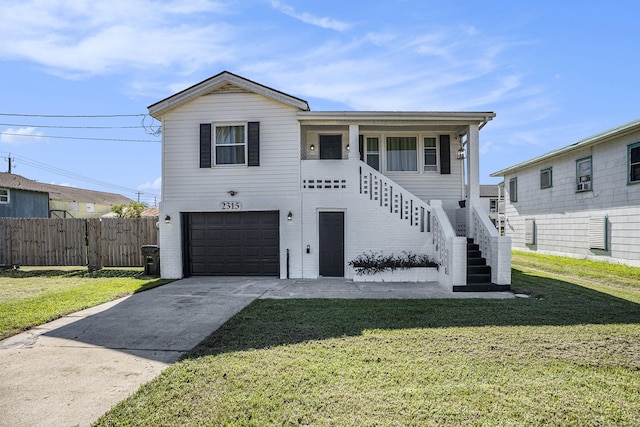 2315 67th St, Galveston, TX 77551 - beach home with an attached garage, stairway, and driveway