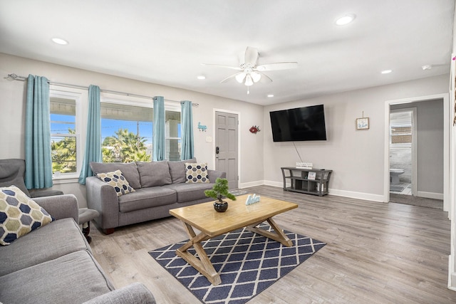 2315 67th St, Galveston, TX 77551 - living room with a ceiling fan, recessed lighting, and light wood-style floors