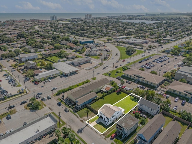 2315 67th St, Galveston, TX 77551 - aerial view of property and surrounding area featuring property parcel outlined and a large body of water