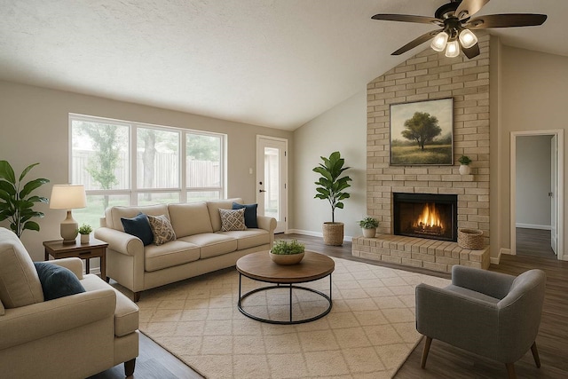 15806 Pfeiffer Dr, Houston, TX 77082 - living room with wood finished floors, vaulted ceiling, a ceiling fan, and a fireplace