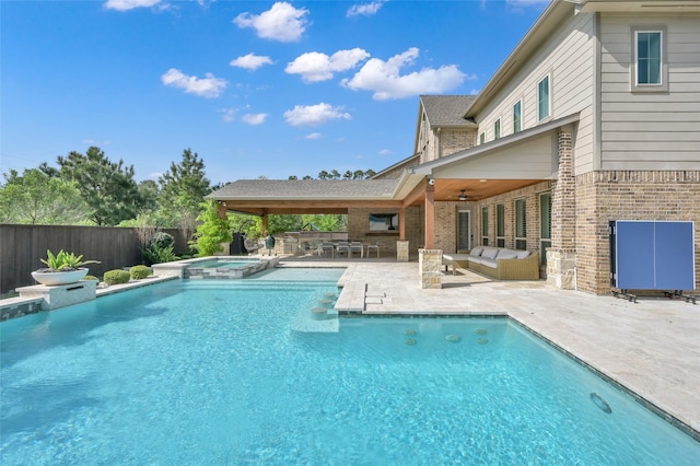 33 Violet Sunset Ln, Tomball, TX 77375 - view of swimming pool featuring a patio area, outdoor lounge area, a fenced backyard, ceiling fan, and a pool with connected hot tub