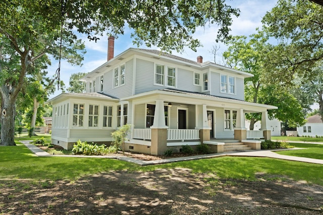 603 Hardeman St, Sealy, TX 77474 - view of front of property featuring a chimney, crawl space, covered porch, ceiling fan, and a front yard