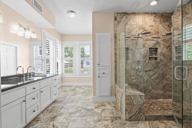 603 Hardeman St, Sealy, TX 77474 - bathroom with vanity and a stall shower