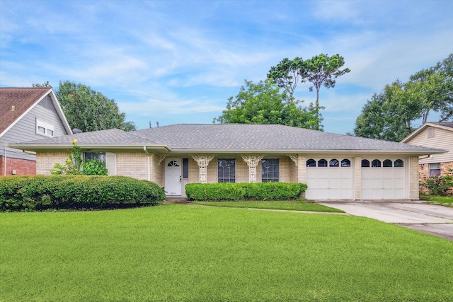 8210 Morley St, Houston, TX 77061 - ranch-style house featuring brick siding, a front yard, concrete driveway, and a garage
