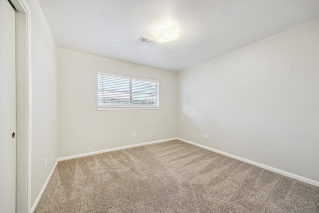 8210 Morley St, Houston, TX 77061 - carpeted spare room featuring baseboards