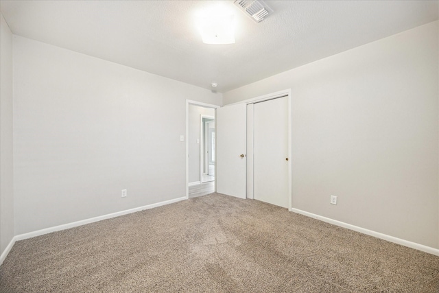 8210 Morley St, Houston, TX 77061 - spare room featuring carpet flooring and baseboards
