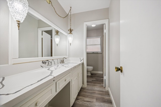 8210 Morley St, Houston, TX 77061 - full bathroom featuring double vanity and wood finished floors