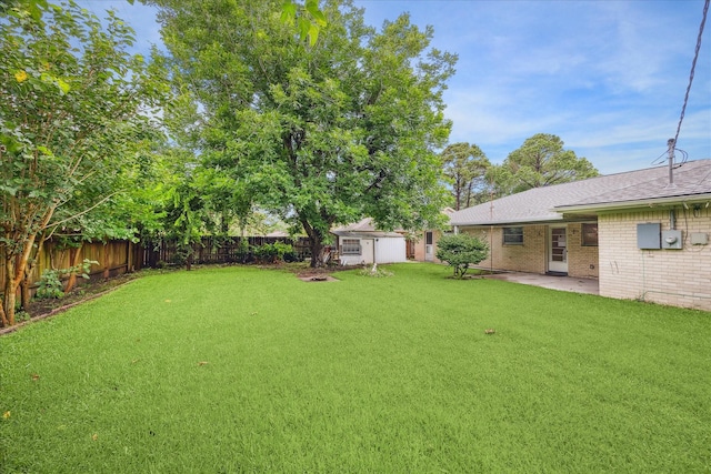 8210 Morley St, Houston, TX 77061 - fenced backyard featuring a patio and a storage unit