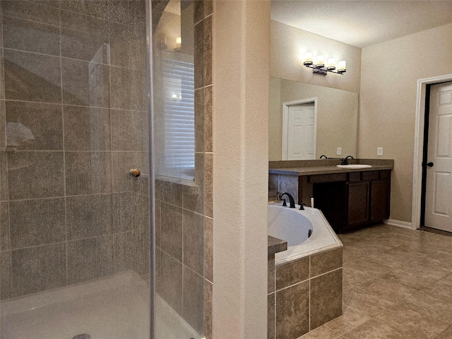 3811 Pearl Pass Ln, Sugar Land, TX 77479 - full bath featuring vanity, a bath, a tile shower, and tile patterned floors