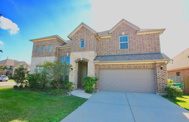 3811 Pearl Pass Ln, Sugar Land, TX 77479 - view of front of house featuring a garage, driveway, a front lawn, and brick siding