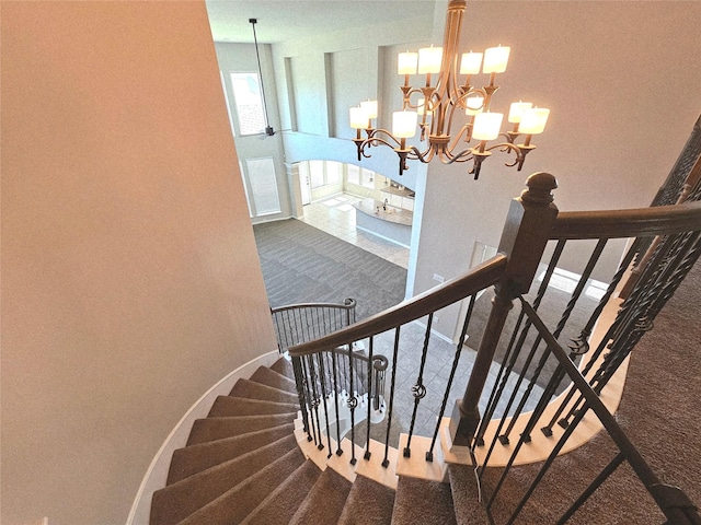 3811 Pearl Pass Ln, Sugar Land, TX 77479 - staircase with carpet and a chandelier