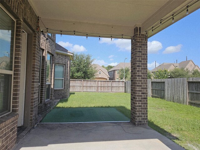 3811 Pearl Pass Ln, Sugar Land, TX 77479 - fenced backyard with a patio