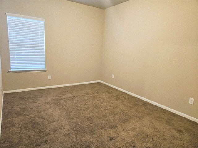 3811 Pearl Pass Ln, Sugar Land, TX 77479 - carpeted empty room featuring baseboards