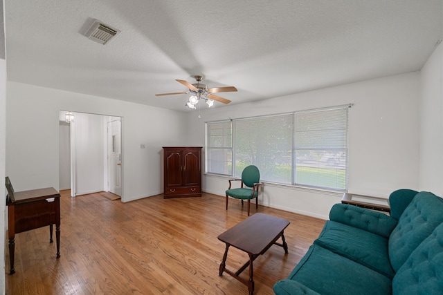 5006 Hazelton St, Houston, TX 77035 - sitting room with light wood-type flooring and ceiling fan