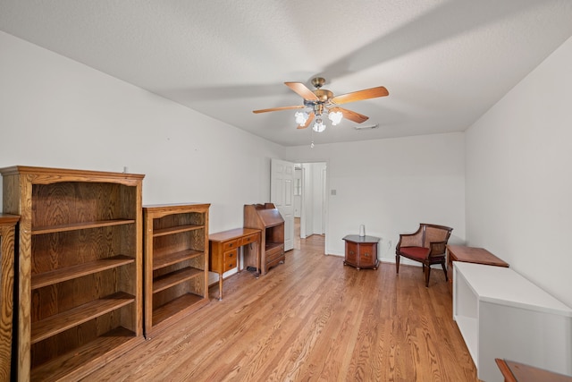 5006 Hazelton St, Houston, TX 77035 - sitting room featuring ceiling fan and light wood-style floors