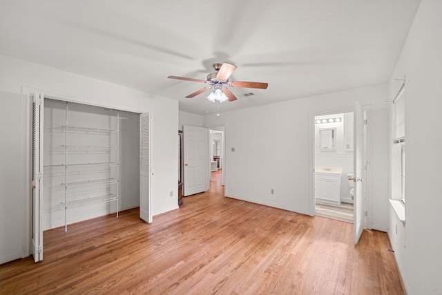 5006 Hazelton St, Houston, TX 77035 - unfurnished bedroom featuring light wood finished floors, a closet, ceiling fan, and connected bathroom