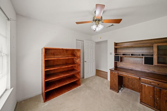5006 Hazelton St, Houston, TX 77035 - home office with light carpet and ceiling fan