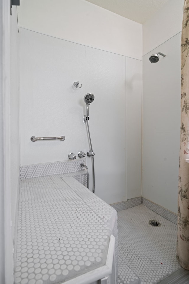 5006 Hazelton St, Houston, TX 77035 - bathroom featuring a shower stall and tile patterned flooring