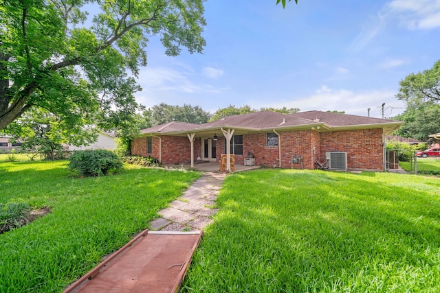 5006 Hazelton St, Houston, TX 77035 - back of property featuring brick siding and french doors