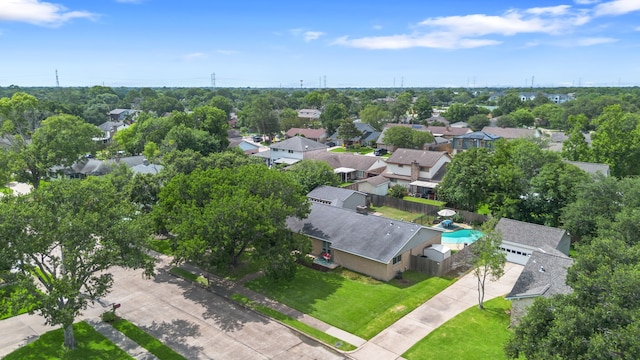 11614 Brighton Ln, Meadows Place, TX 77477 - aerial perspective of suburban area with a tree filled landscape