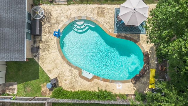 11614 Brighton Ln, Meadows Place, TX 77477 - drone / aerial view of a pool area