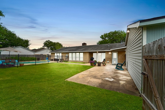 11614 Brighton Ln, Meadows Place, TX 77477 - fenced backyard with a patio area