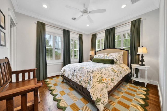 811 Byrne St, Houston, TX 77009 - bedroom featuring multiple windows, wood finished floors, ornamental molding, recessed lighting, and a ceiling fan
